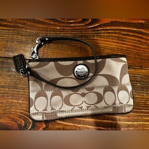 Coach Beige Signature wristlet convenient luxury minimalist small on the go